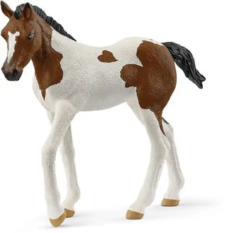 Schleich Horse Club Paint Horse Veulen – Nieuwsgierig & Speels - De Dondersteen